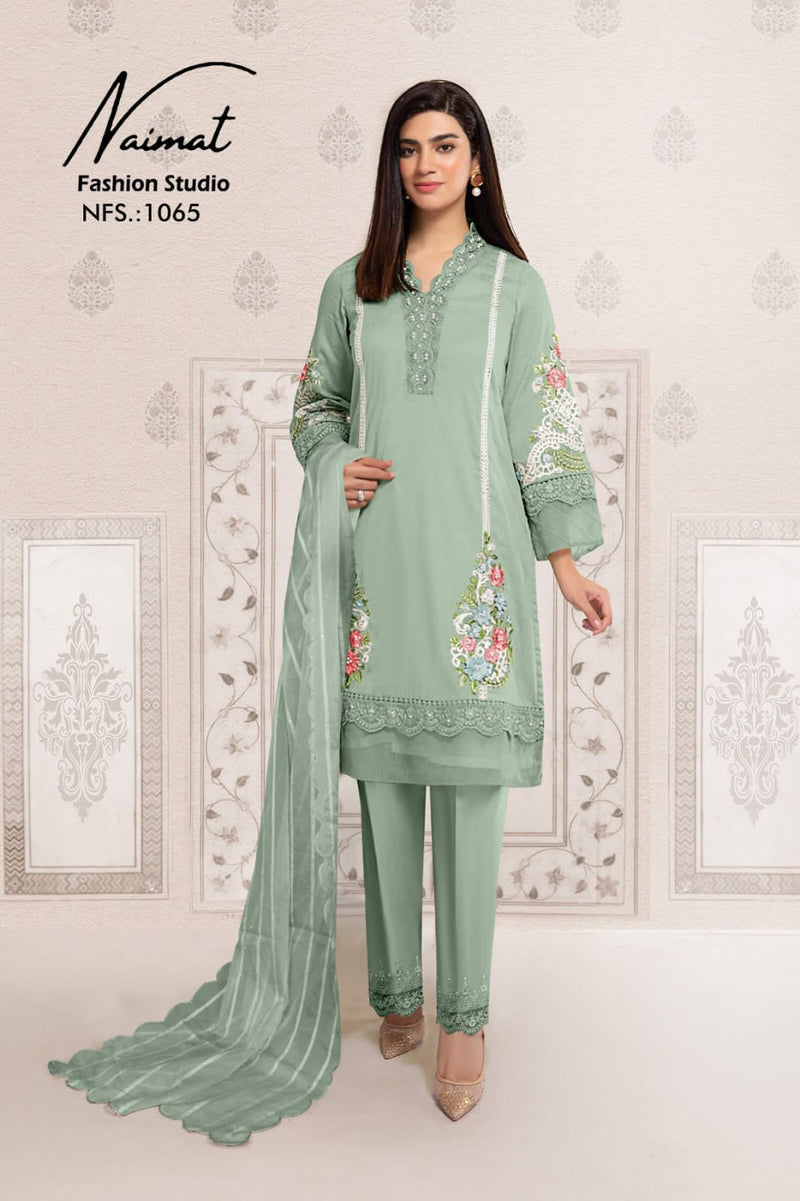 Naimat Fashoin Studio beautiful embroidery work with pearls in top and slive Salwar Kameez