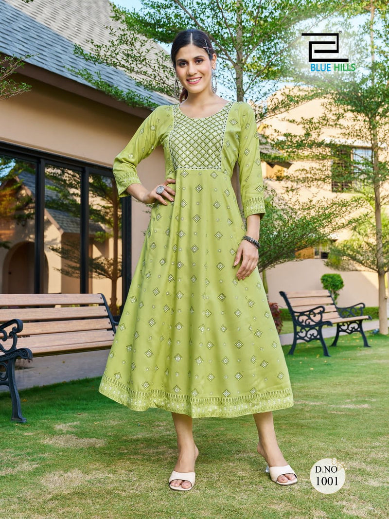 Blue Hills Zest Rayon Prints Fancy Party Wear Gowns For Woman