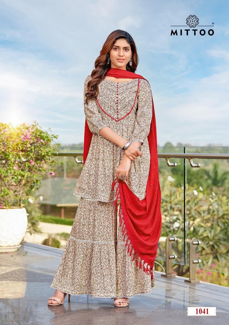 Mittoo Ceremony Rayon Fancy Printed Festiver Wear Kurtis With Sharara Bottom & Dupatta