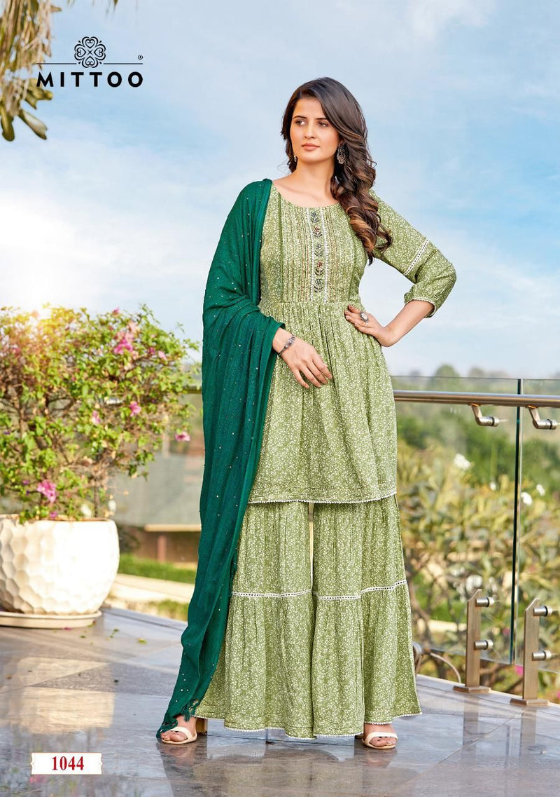 Mittoo Ceremony Rayon Fancy Printed Festiver Wear Kurtis With Sharara Bottom & Dupatta