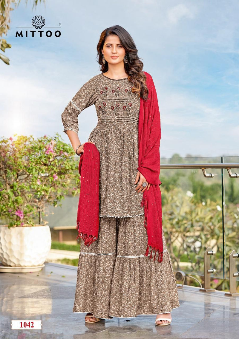 Mittoo Ceremony Rayon Fancy Printed Festiver Wear Kurtis With Sharara Bottom & Dupatta