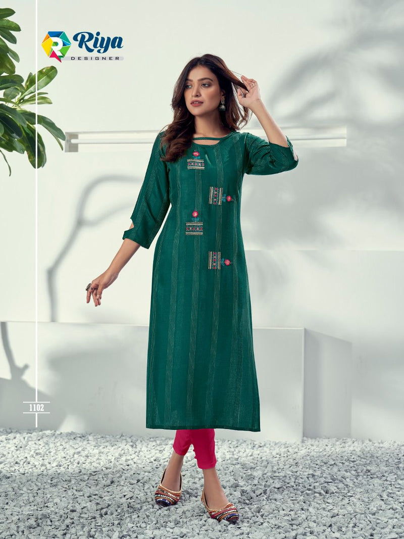 Riya Designer Alivia Rayon Weaving Pattern With Embroidery Work Kurti