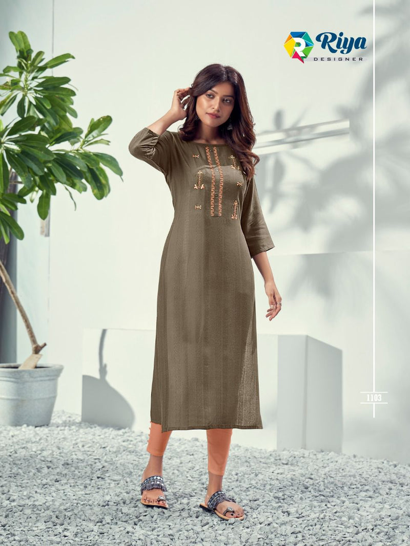 Riya Designer Alivia Rayon Weaving Pattern With Embroidery Work Kurti