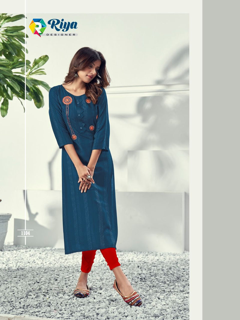 Riya Designer Alivia Rayon Weaving Pattern With Embroidery Work Kurti